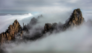 Boy Worships Guanyin - The famous scene of Huang Shan Mountain of Anhui Province, China